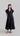 Front view of Psophía SS26 women’s flowy poplin maxi dress featuring a deep V-neckline, puff sleeves, and a softly flared skirt